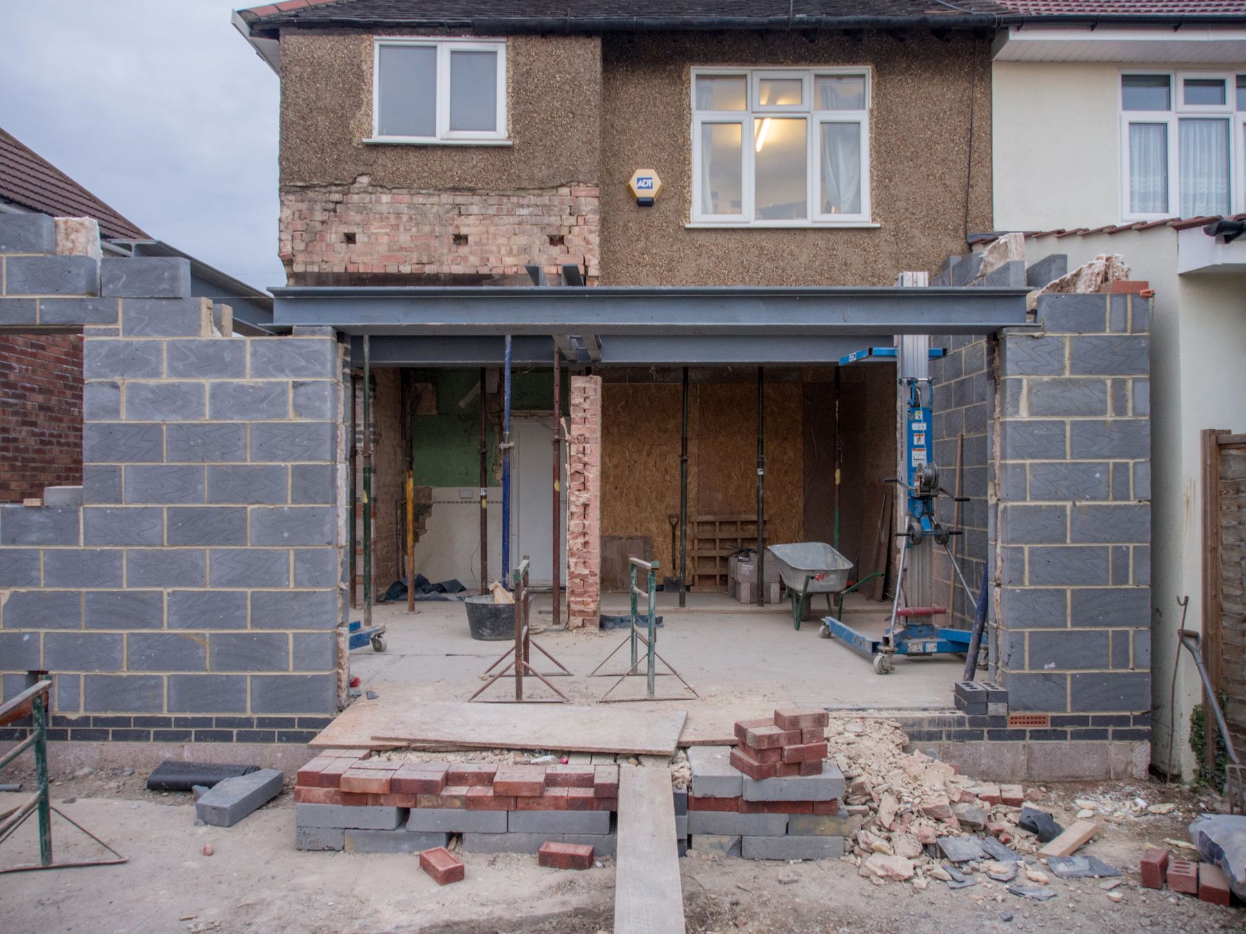 Scaffolding installed around a British residential house extension